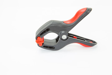 Plastic spring clamp on white background, Isolated.