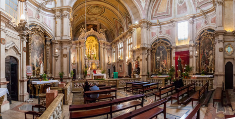 Lisbon, Portugal - October 24, 2016: Santo Antonio de Lisboa Church interior. Built on the Saint Anthony of Lisbon aka of Padua or Padova birth location. View of Nave and Chapels in Baroque style.