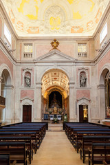 Fototapeta na wymiar Lisbon, Portugal - October 24, 2016: Igreja da Conceicao Velha or Old Our Lady of the Conception Church interior. View of Nave and Chapels. Renaissance, Mannerist and Baroque style