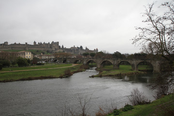 Obraz premium Medieval Carcassone town view, FranceView of the big Castle of Carcassonne at sunset from the town.