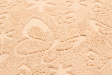 bath towel with butterfly patterns. textured fabric background