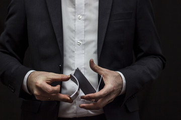 Man with flying playing cards