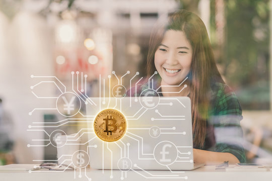 Closeup Asian businesswoman hand using technology tablet with Bitcoins mockup over the Abstract photo of FINTECH connection hologram in workplace co-working space,blockchain and bitcoin concept - Powered by Adobe