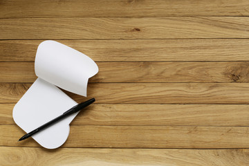 old boards of oak. in the lower left corner is a notebook. suitable for background.