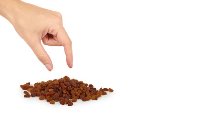 delicious and healthy raisins in hand isolated on white background, healthy sweet snack. copy space, template
