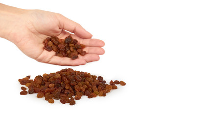 delicious and healthy raisins in hand isolated on white background, healthy sweet snack. copy space, template