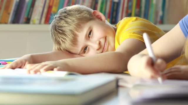 Portrait of a smiling elementary school student. Funny boy. 
