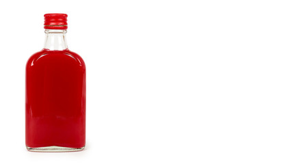 Glass bottle with red tincture isolated on white background. Alcohol problem. copy space, template
