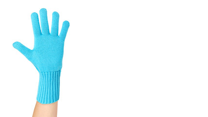 Warm winter children's gloves in hand isolated on white background. Sale and buy. copy space, template