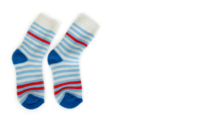 Warm winter children's stiped socks isolated on white background. Sale and buy. copy space, template