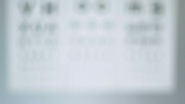 Point of view of person selecting glasses for quality clear view, optics store