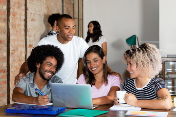 Hispanic and african american business team of young people