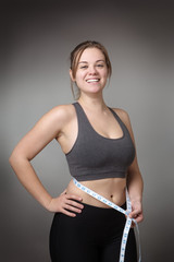 fitness model on gray background