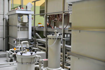 The shop for the production and processing of hydraulic equipment from plastic pipes under pressure at the oil station.