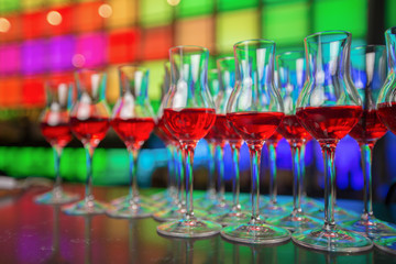 
Glass dishes in color lights background

