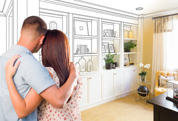 Young Military Couple Facing Custom Built-in Shelves and Cabinets Design Drawing Gradating to...