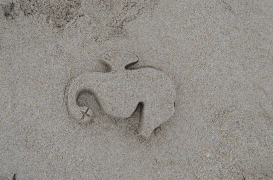 Sand Art At Beach