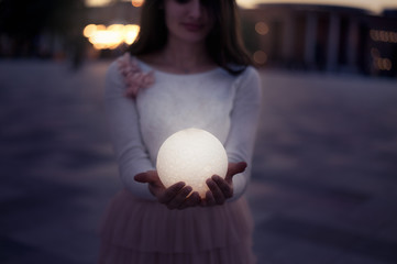 Close up moon in woman's hands