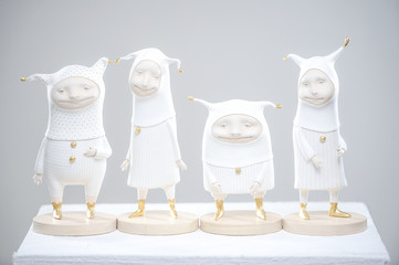 Porcelain paper mache clay statuette jesters