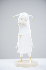 Porcelain paper mache clay statuette jester