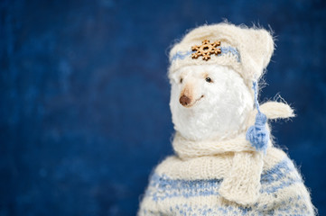 Fototapeta premium Woolen polar bear knitted sweater hat scarf toy