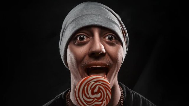 guy with Chupa Chups