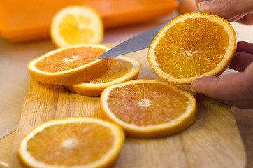 Fototapeta premium Oranges sliced on the table 