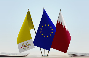 Flags of Vatican City European Union and Qatar