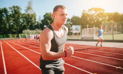 Man Running On Track