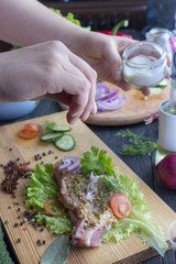The process of cooking a steak, with all the ingredients on the table, selective focus