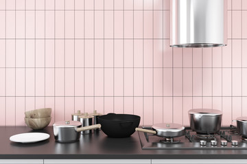 Obraz na płótnie Canvas Pink kitchen, black counter, cooker