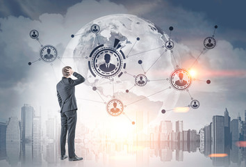 Confused businessman, network hologram in city