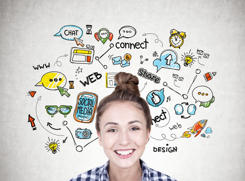 Smiling young woman with a bun, social media