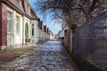  barrier covers the passage of the old European street to a private area.