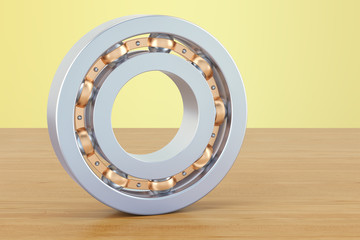 Ball bearing on the wooden table. 3D rendering