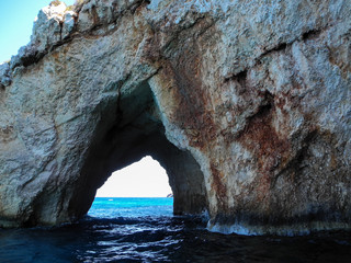 Rock arches in sea near Blue Caves on Zakynthos island