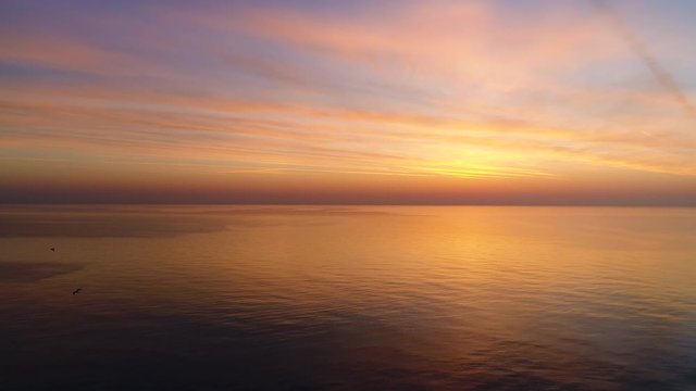 Aerial view of beautiful sunrise over the sea.