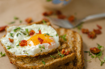 Eggs and fried wholemeal bread, breakfast.