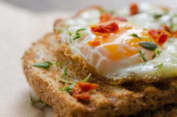 Eggs and fried wholemeal bread, breakfast.