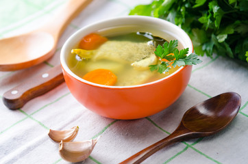 Fish soup served on the table in plate