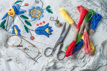 Closeup of embroidered napkins and color mulina