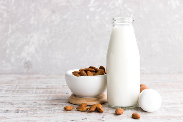Obraz na płótnie Canvas Almond milk in a bottle