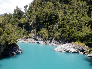 Fototapeta na wymiar Turquoise Blue Water of the Hokitika River Through the Rock Sided at Hokitika Gorge Scenic Reserve, West Coast, South Island, New Zealand