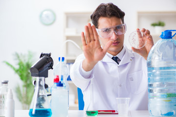 Fototapeta premium Lab assistant testing water quality