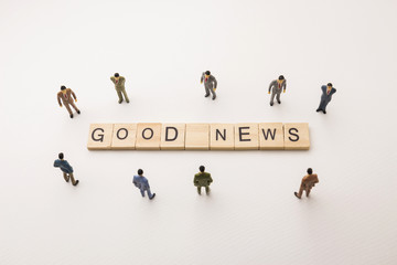 businessman figures meeting on good news conceptual