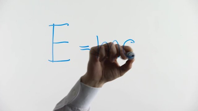Mass-energy equivalence formula written on glass, laws of classical physics