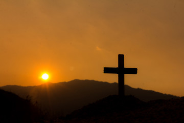 Crucifixion Of Jesus Christ., cross silhouette on the mountain at sunset