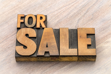 For sale banner in wood type