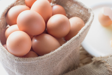 Many eggs are in the brown bag.