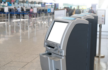 Self service check-in kiosks at International Airport for passenger. Close up of blank screen...
